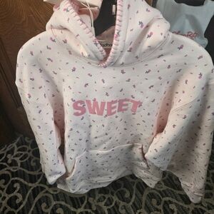 Madhappy Pink Hoodie with Floral Accents